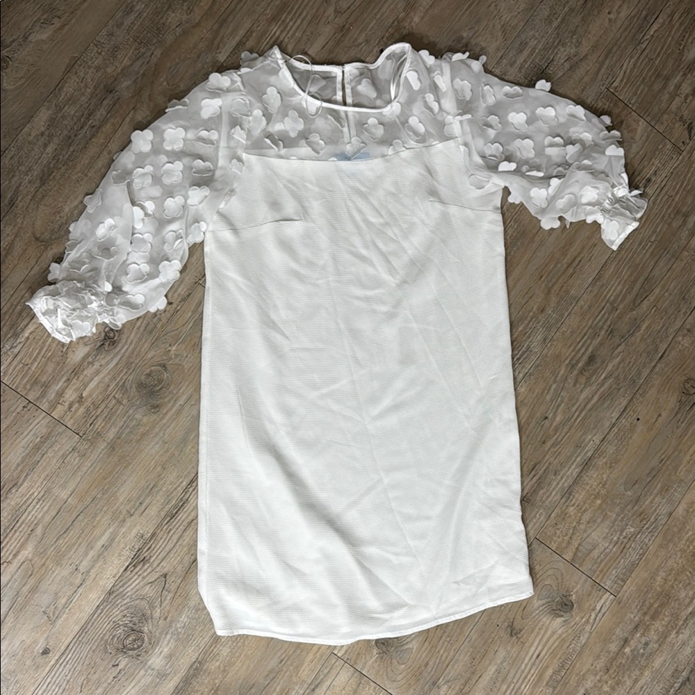 Elegant White Dress with Sheer Floral Sleeves